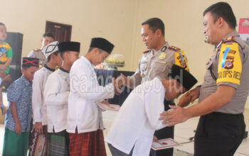 Gelar Hari Bhayangkara ke 71 Secara Sederhana, Polisi Santuni Anak Yatim