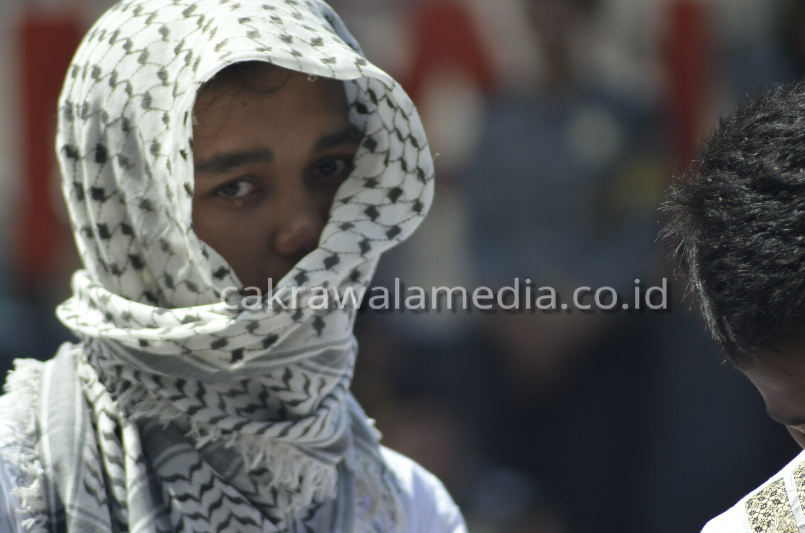 Salah seorang aktivis islam saat mengikuti aksi solidaritas dan keprihatinan umat islam tentang pembubaran HTI di Tasikmalaya ( foto by dezaf )