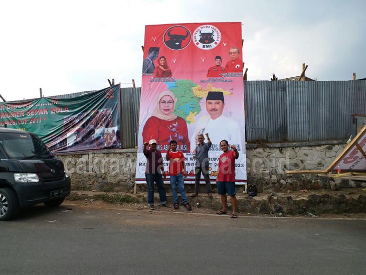 Sebar Baliho, BMI Makin Mantap Dukung Elin-Maman