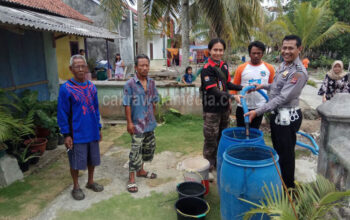 Shooter Poachers Club Pangandaran Bagikan Air Bersih Kepada Warga