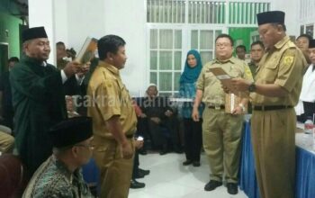Camat Caringin Melantik Momo S.E Jadi Pjs Kades Cinagara