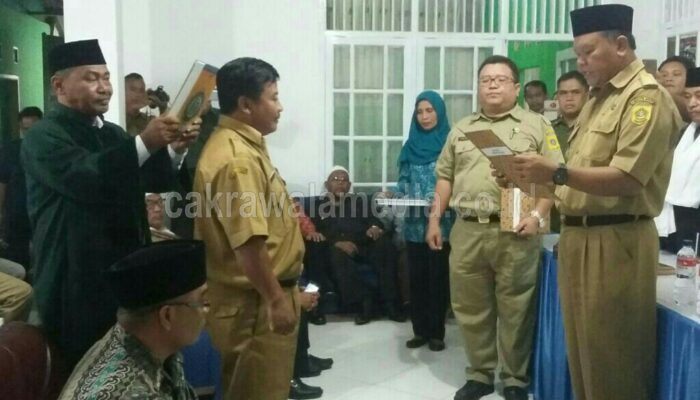Camat Caringin Melantik Momo S.E Jadi Pjs Kades Cinagara