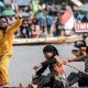 Tradisi Pacu Jalur Kuansing, Dari Transportasi Sungai hingga Meme Viral Dunia