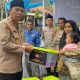Program Rutilahu Hadir di Ciakar, Polres Tasikmalaya Serahkan Bantuan Sosial